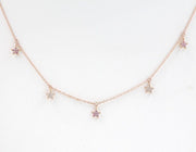 Picture of star charm necklaces with diamonds and