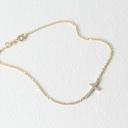 Picture of tiny cross charm diamond set 14k solid