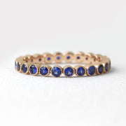 Picture of sapphire eternity band blue sapphire