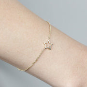 Picture of star charm bracelet 14k gold star