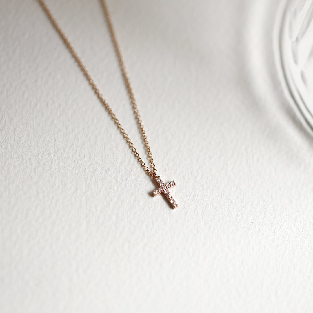 Picture of dainty diamond cross necklace minimalist