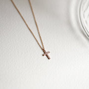 Picture of dainty diamond cross necklace minimalist