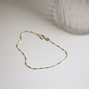 Picture of tube rolo chain bracelet gold chain