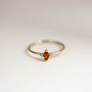Picture of orange sapphire marquise diamond ring