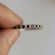 Picture of sapphire eternity band blue sapphire