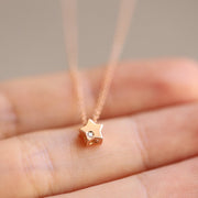 Picture of 14k gold star circle flower charm