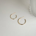 Load image into Gallery viewer, Picture of open hoops solid gold earrings gold hoop
