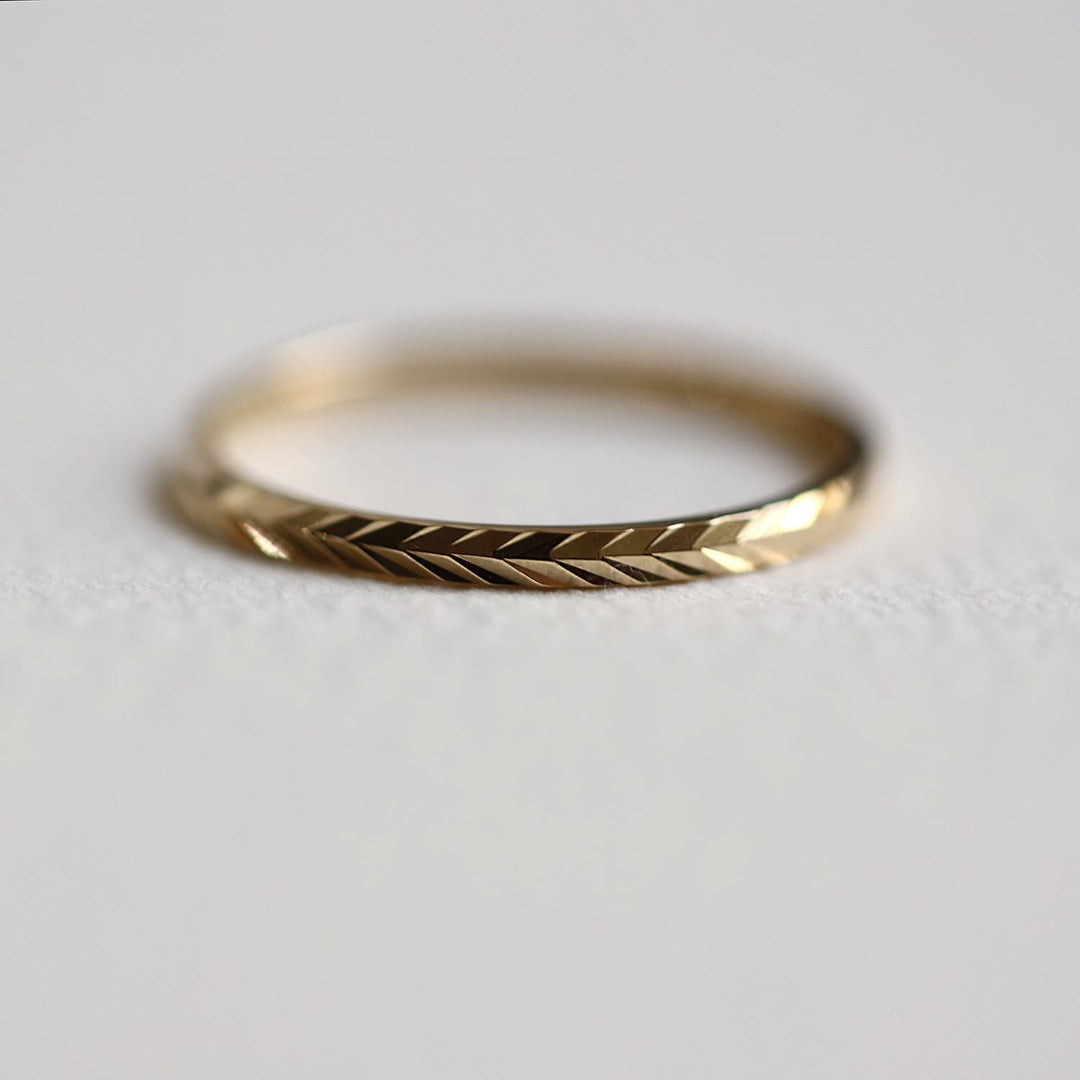 Picture of herringbone eternity ring 14k gold