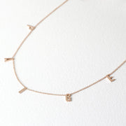 Picture of initial necklace name necklace five