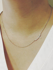 Picture of sideways diamond cross necklace diamond