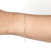 Picture of tiny cross charm diamond set 14k solid