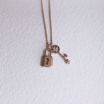 Load image into Gallery viewer, Picture of diamond lock and key pendant necklace
