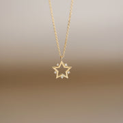 Picture of 14k gold star pendant necklace with