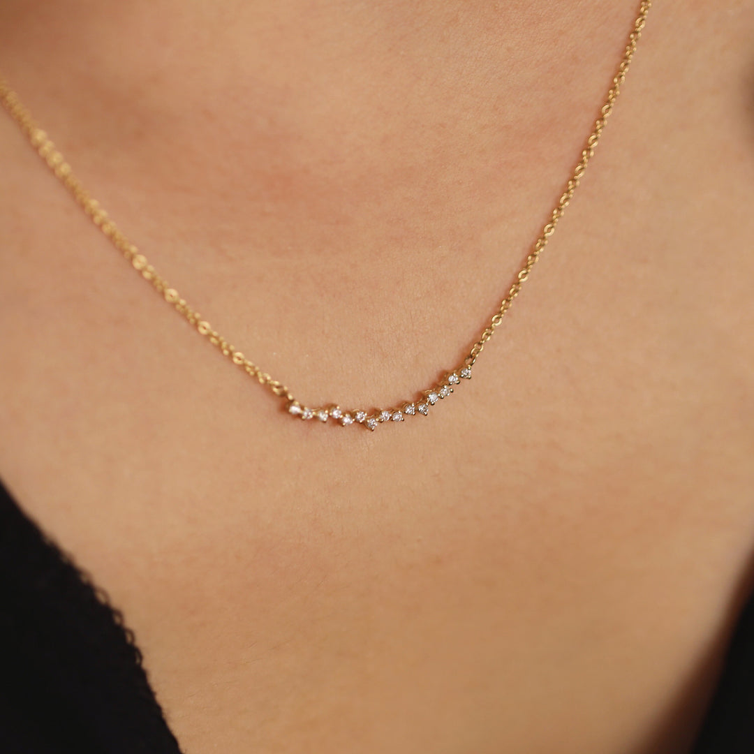 Picture of curved cluster diamond necklace diamond