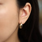 Load image into Gallery viewer, Picture of asymmetrical hoops solid gold earrings
