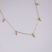 Picture of arrow dangle charm necklace arrow charm