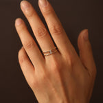 Load image into Gallery viewer, Picture of baguette cut white sapphire ring
