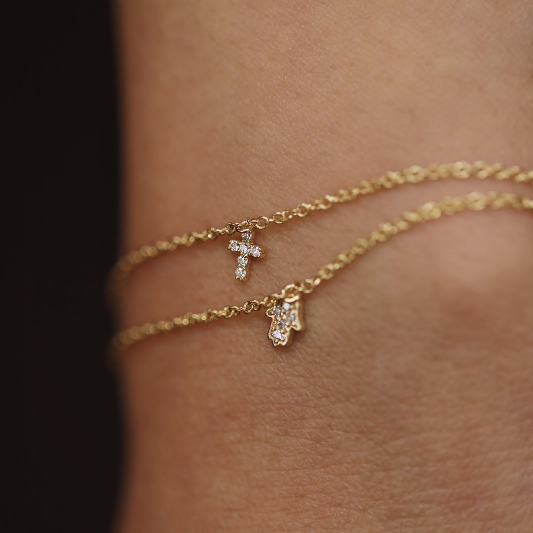 Picture of diamond bracelet diamond cross charm