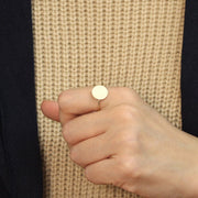 Picture of minimalist ring gold disc ring geometric
