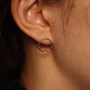 Picture of open circle karma with garnet gemstone