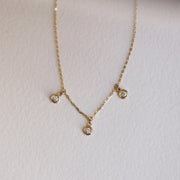 Picture of diamond charm necklace 3 bezel diamond