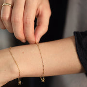 Picture of tube rolo chain bracelet gold chain