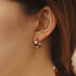 Load image into Gallery viewer, Picture of asymmetrical hoops solid gold earrings
