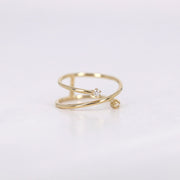 Picture of diamond ring open cross ring criss cross