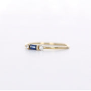Picture of baguette cut blue sapphire ring with two