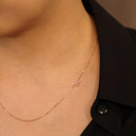 Load image into Gallery viewer, Picture of sideways diamond initial necklace
