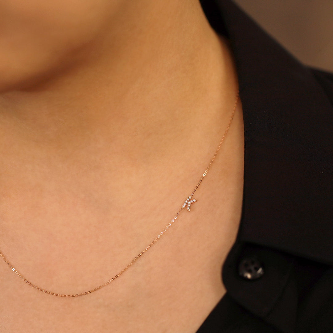 Picture of sideways diamond initial necklace