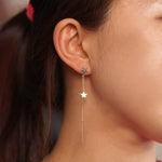 Load image into Gallery viewer, Picture of star earring two stars drop earring 14k
