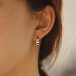 Load image into Gallery viewer, Picture of asymmetrical hoops solid gold earrings
