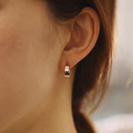 Load image into Gallery viewer, Picture of asymmetrical hoops solid gold earrings
