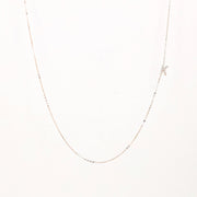 Picture of sideways diamond initial necklace