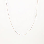 Picture of sideways diamond initial necklace