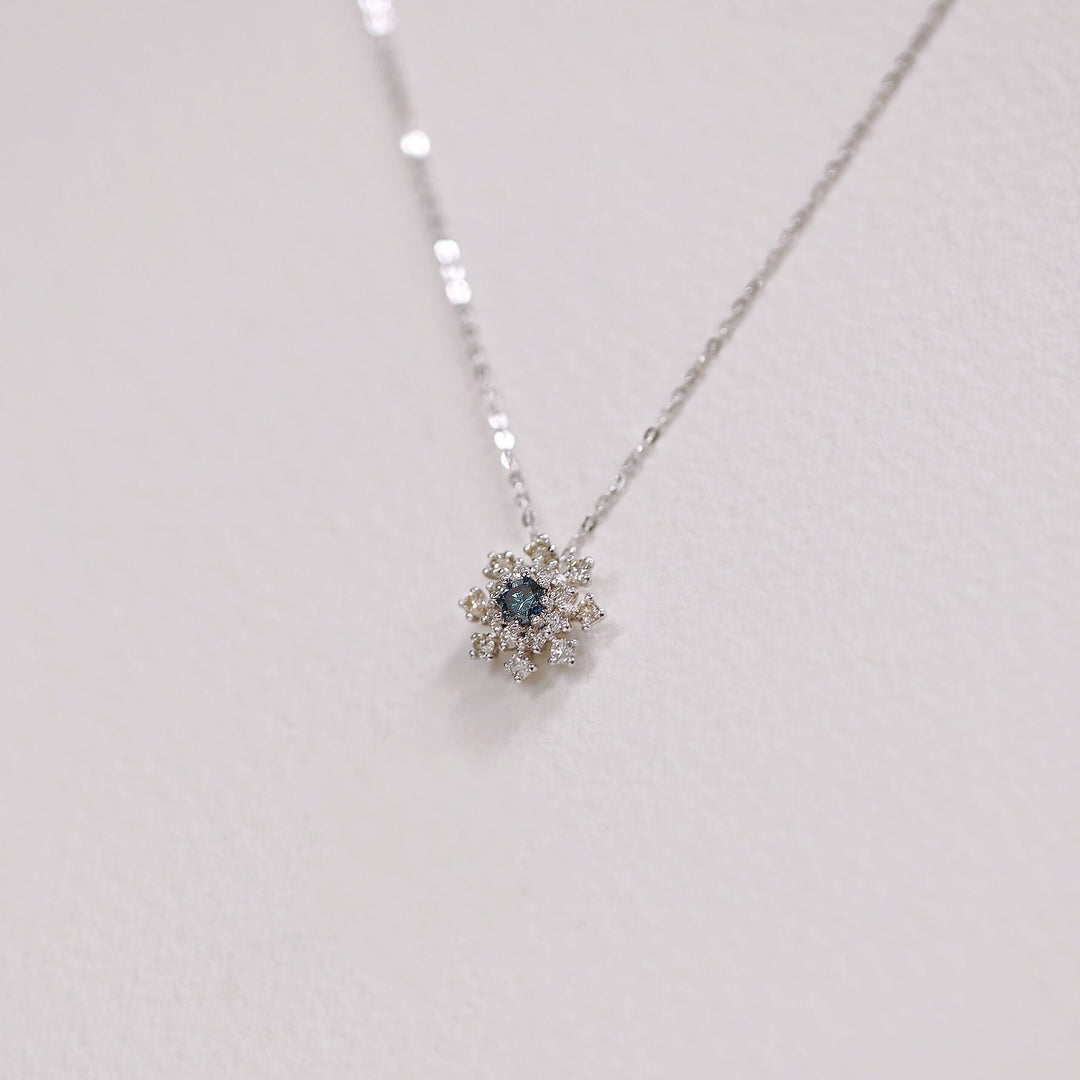 Picture of blue diamond cluster snowflake necklace