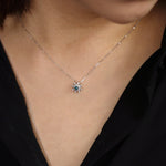 Load image into Gallery viewer, Picture of blue diamond cluster snowflake necklace
