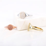 Picture of textured surface oval signet ring 10k