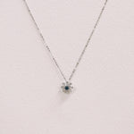 Load image into Gallery viewer, Picture of blue diamond cluster snowflake necklace
