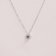 Picture of blue diamond cluster snowflake necklace