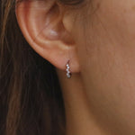 Load image into Gallery viewer, Picture of diamond cluster huggie earrings 10mm
