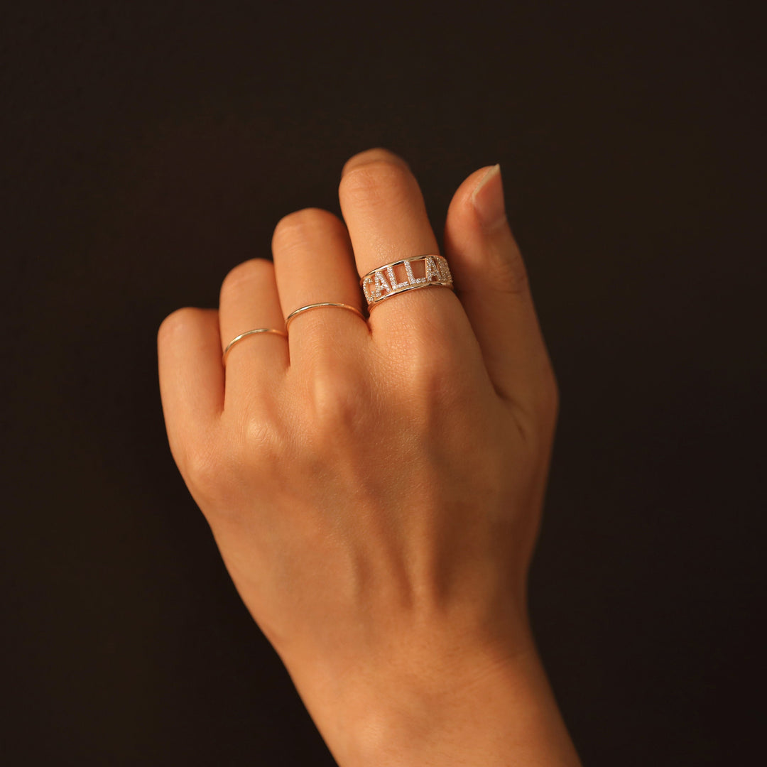 Picture of diamond name ring monogram diamond