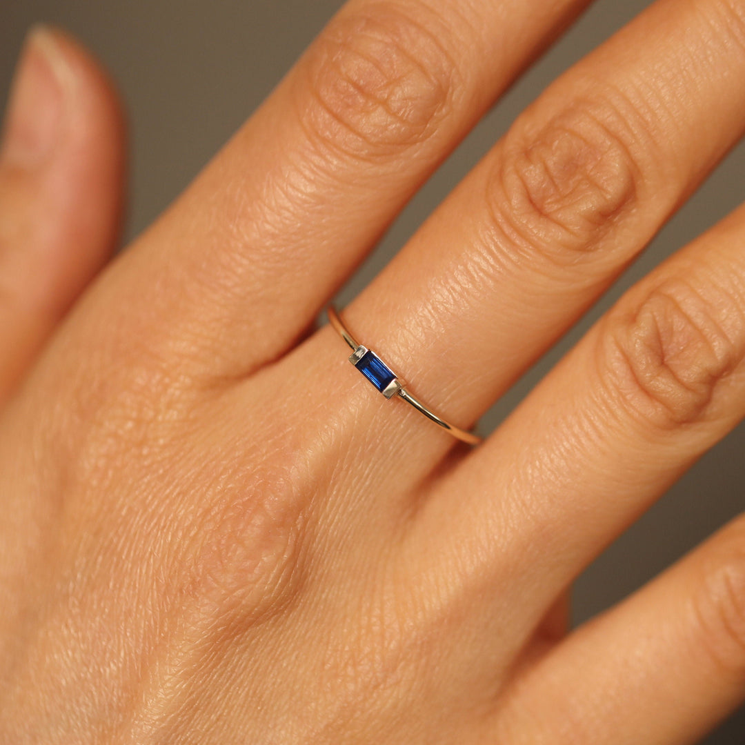 Picture of baguette blue sapphire ring band