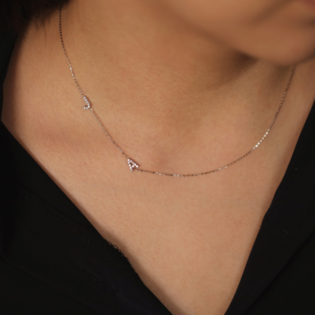 Picture of sideways diamond initials necklace