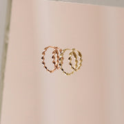 Picture of twist circle hoops circle huggie hoops