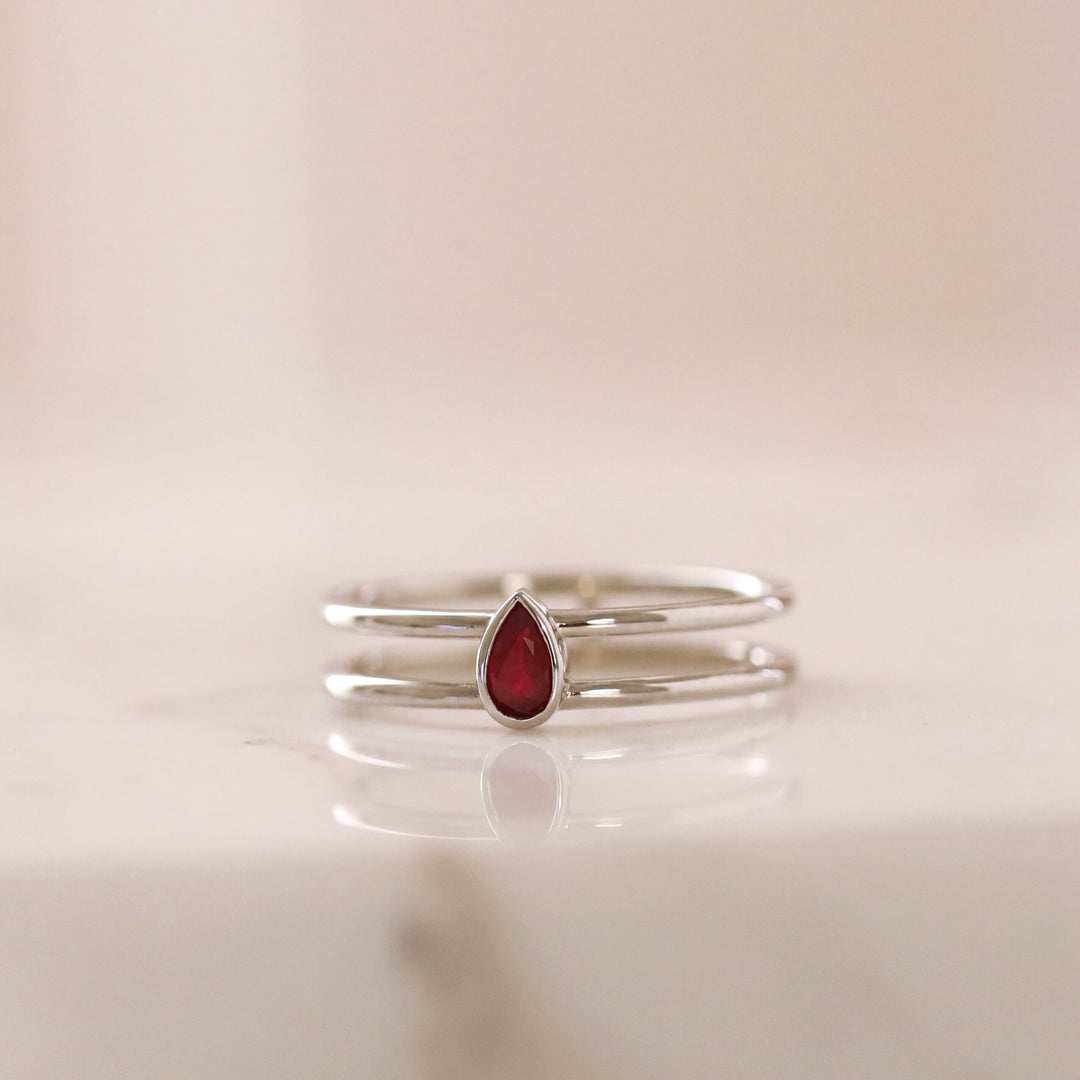 Picture of pear shape ruby solitaire ring double