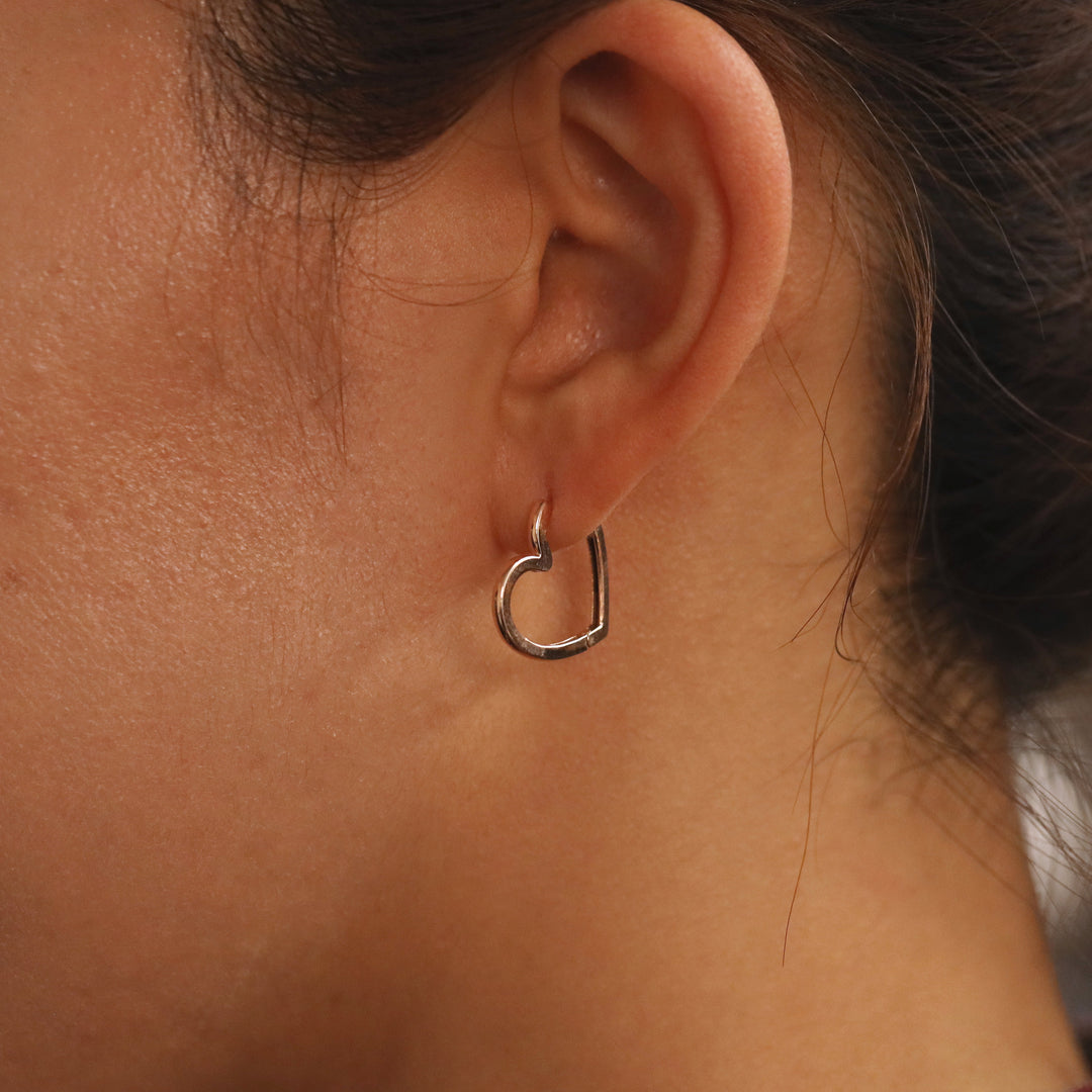 Picture of heart shaped huggie earrings heart hoop