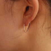 Picture of 14k gold irregular twist hoop earrings