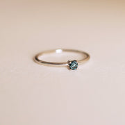 Picture of natural blue diamond ring 4 prong ring